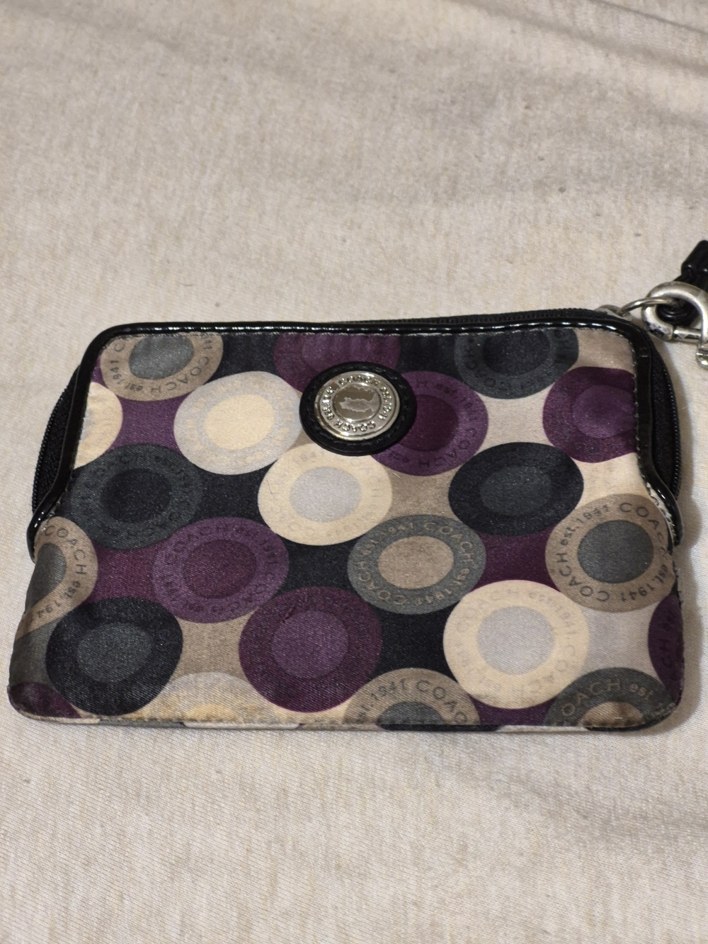 Coach Multi‑Circle Purple and Gray Wristlet